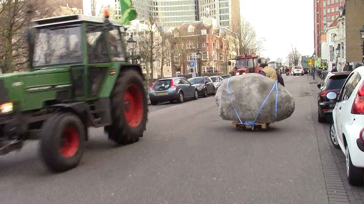 screenshot of video documentation of the tranportation of the rock